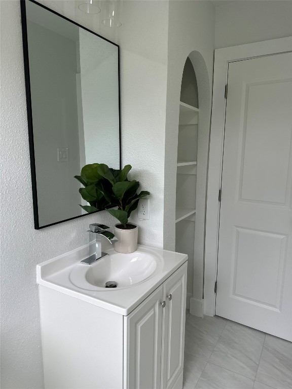 726 Banton Street Channelview, TX 77530 - Photo 22 of 30 a bathroom with a sink and a mirror