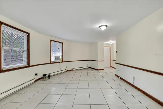 a view of an empty room and window