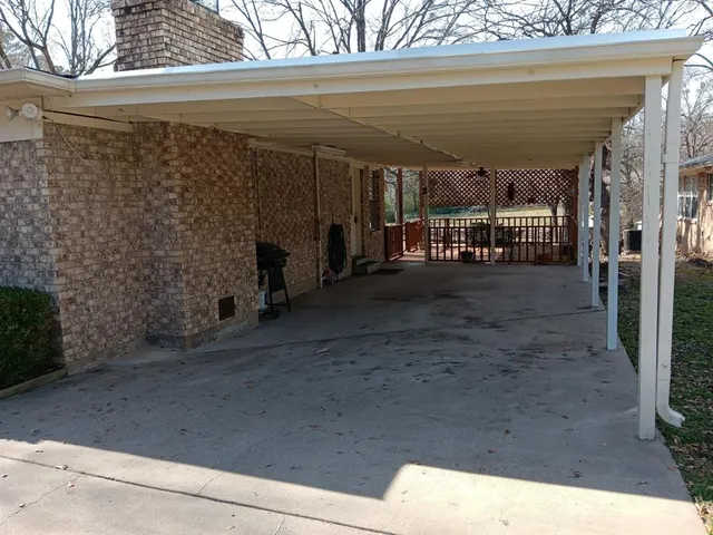 a view of a deck with a fence