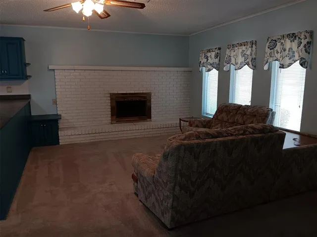 a view of a porch with wooden floor