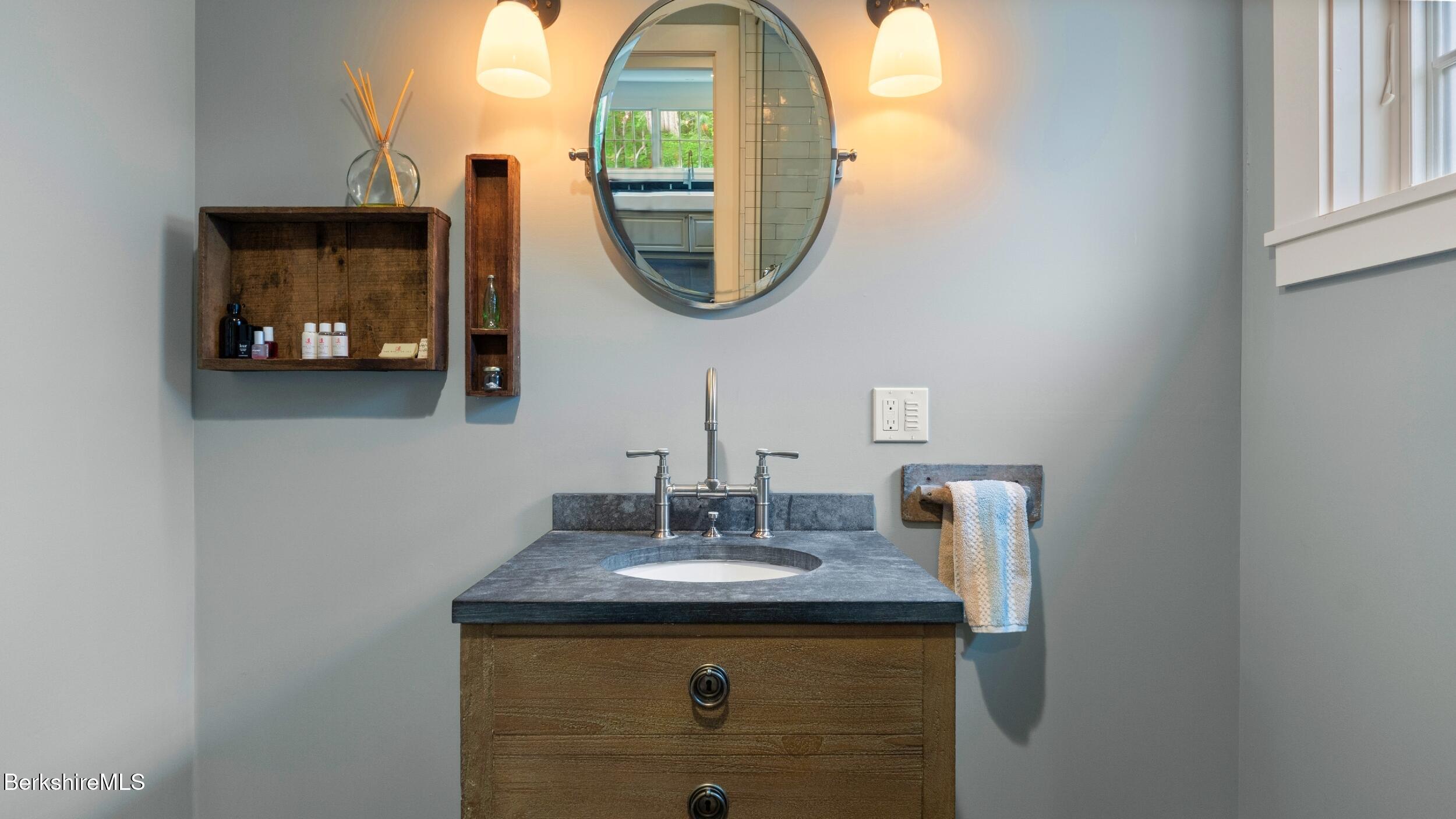 8 Yale Hill Road Stockbridge, MA 01262 - Photo 25 of 51 a bathroom with a sink and a mirror