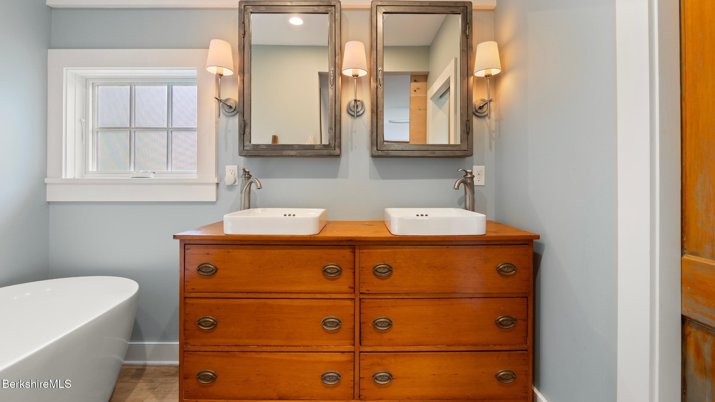 8 Yale Hill Road Stockbridge, MA 01262 - Photo 30 of 51 a bathroom with a sink and a mirror