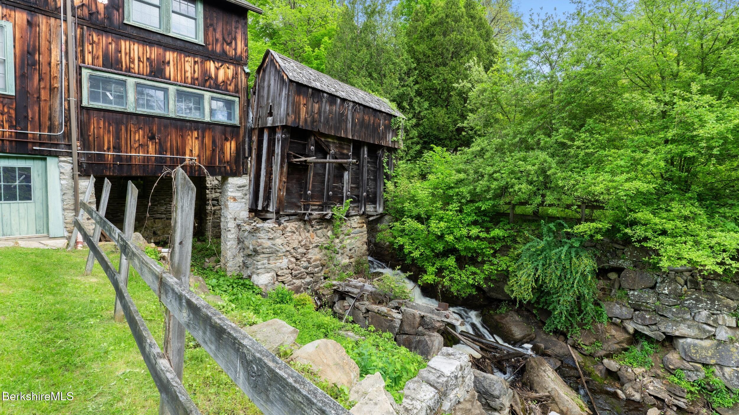 8 Yale Hill Road Stockbridge, MA 01262 - Photo 47 of 51 a front view of a house with a yard