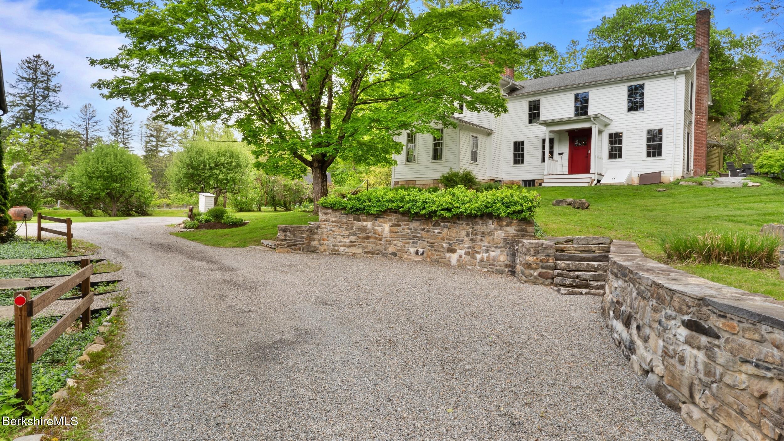 8 Yale Hill Road Stockbridge, MA 01262 - Photo 5 of 51 a front view of a house with a yard and trees