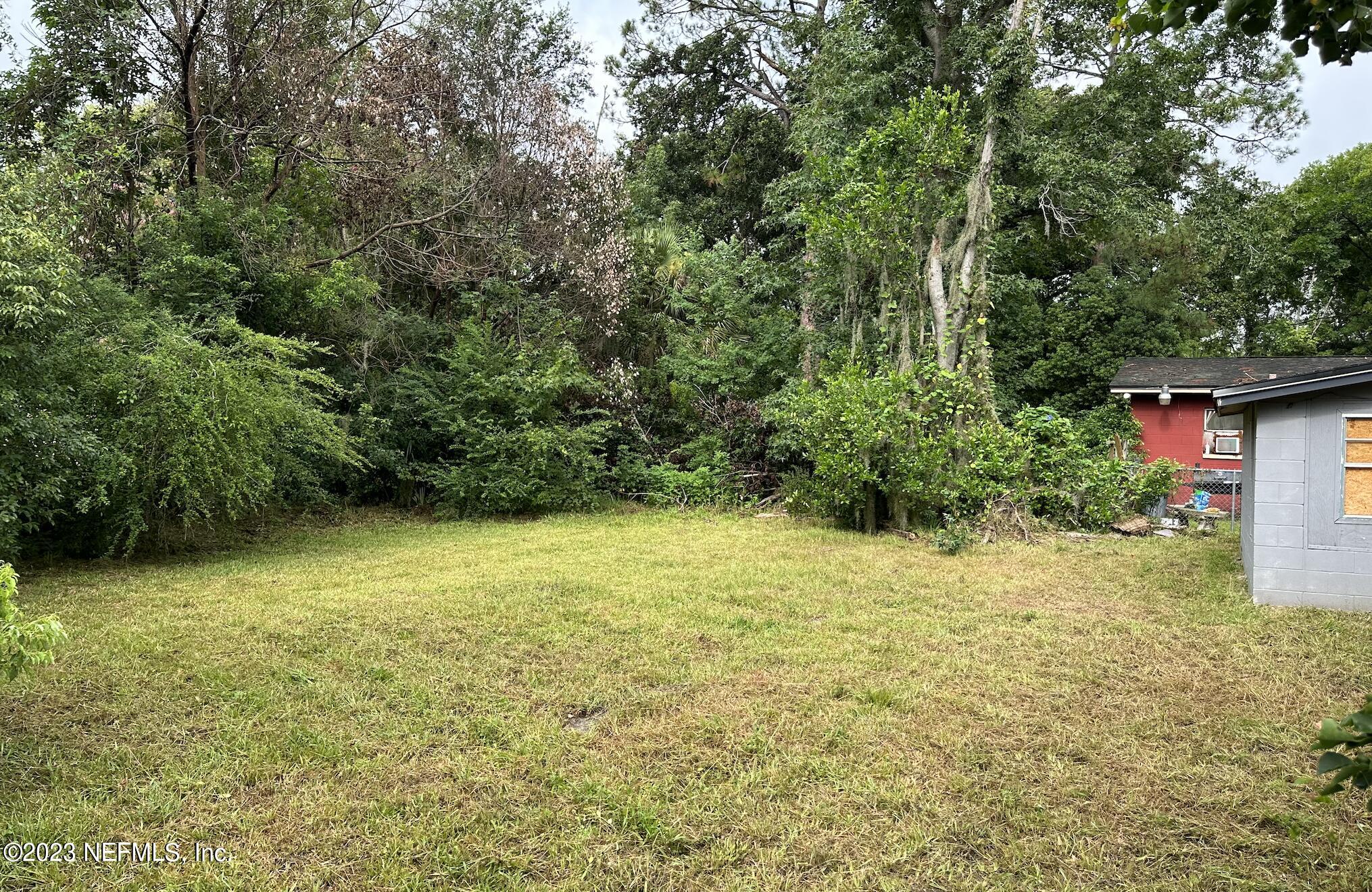 7472 Melvin Road Jacksonville, FL 32210 - Photo 3 of 5 a view of outdoor space and yard