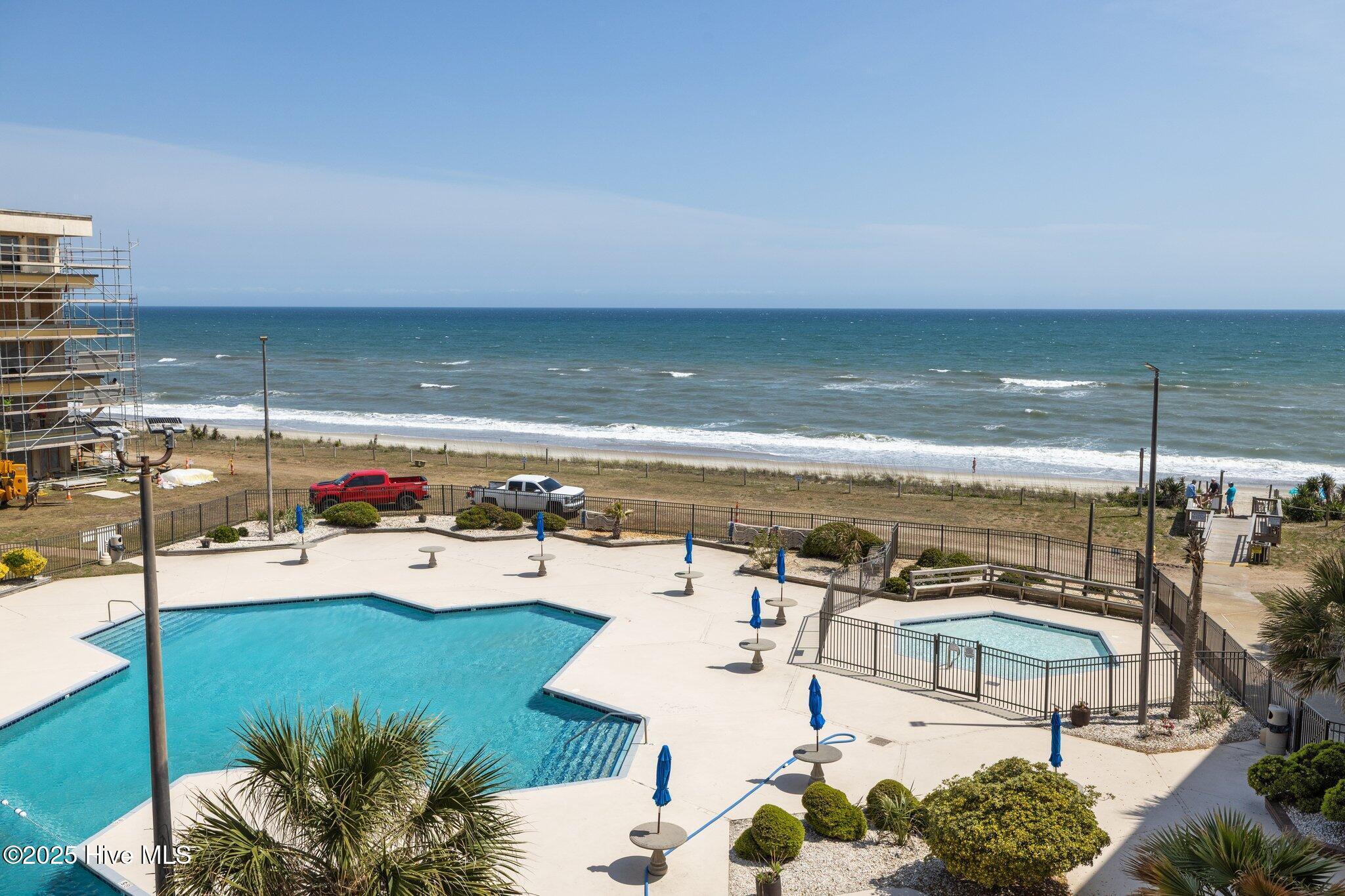 1505 Salter Path Road, Unit 409 Indian Beach, NC 28512 - Photo 27 of 35 Pool View from Balcony