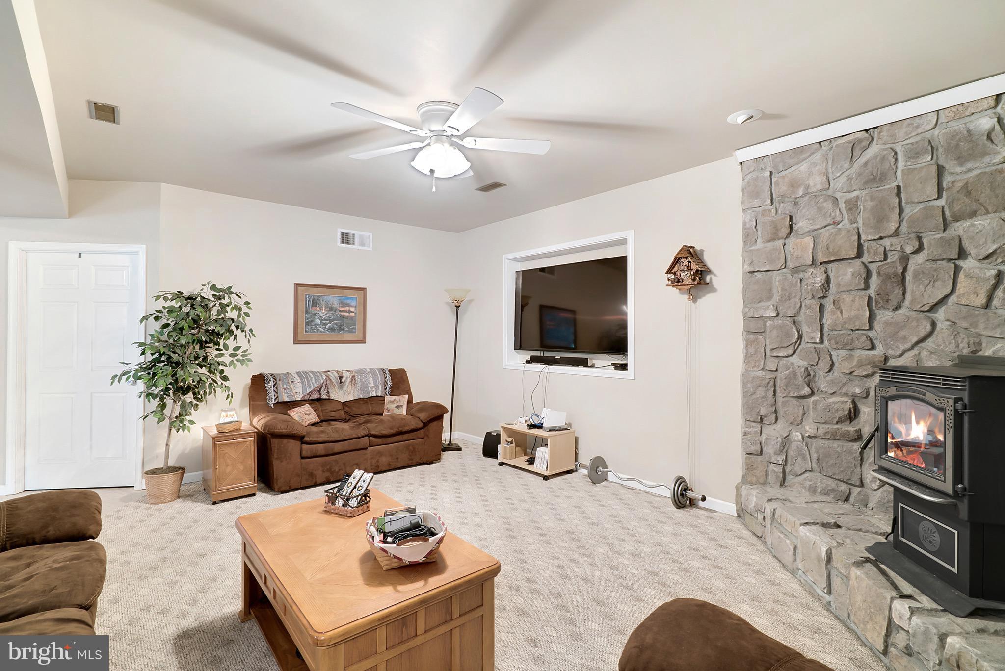 11178 Spring Hollow Lane Rixeyville, VA 22737 - Photo 27 of 30 Family room with wood stove