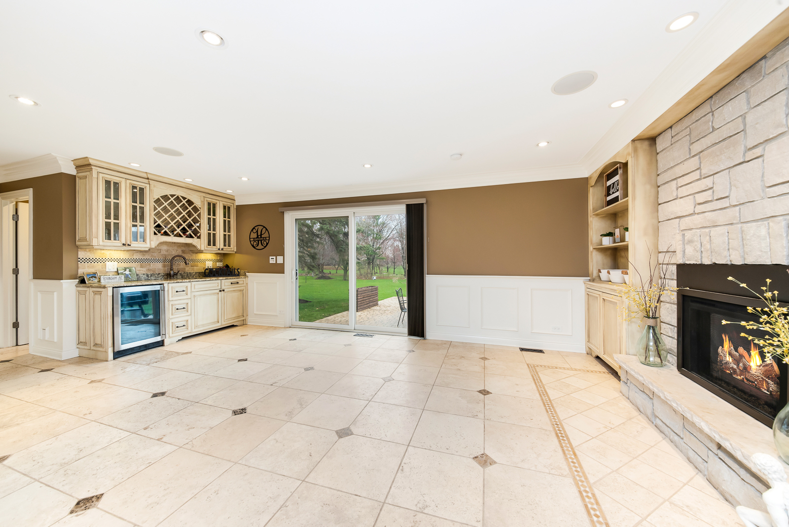 7 Sorrel Lemont, IL 60439 - Photo 14 of 36 a view of a kitchen with furniture and a fireplace