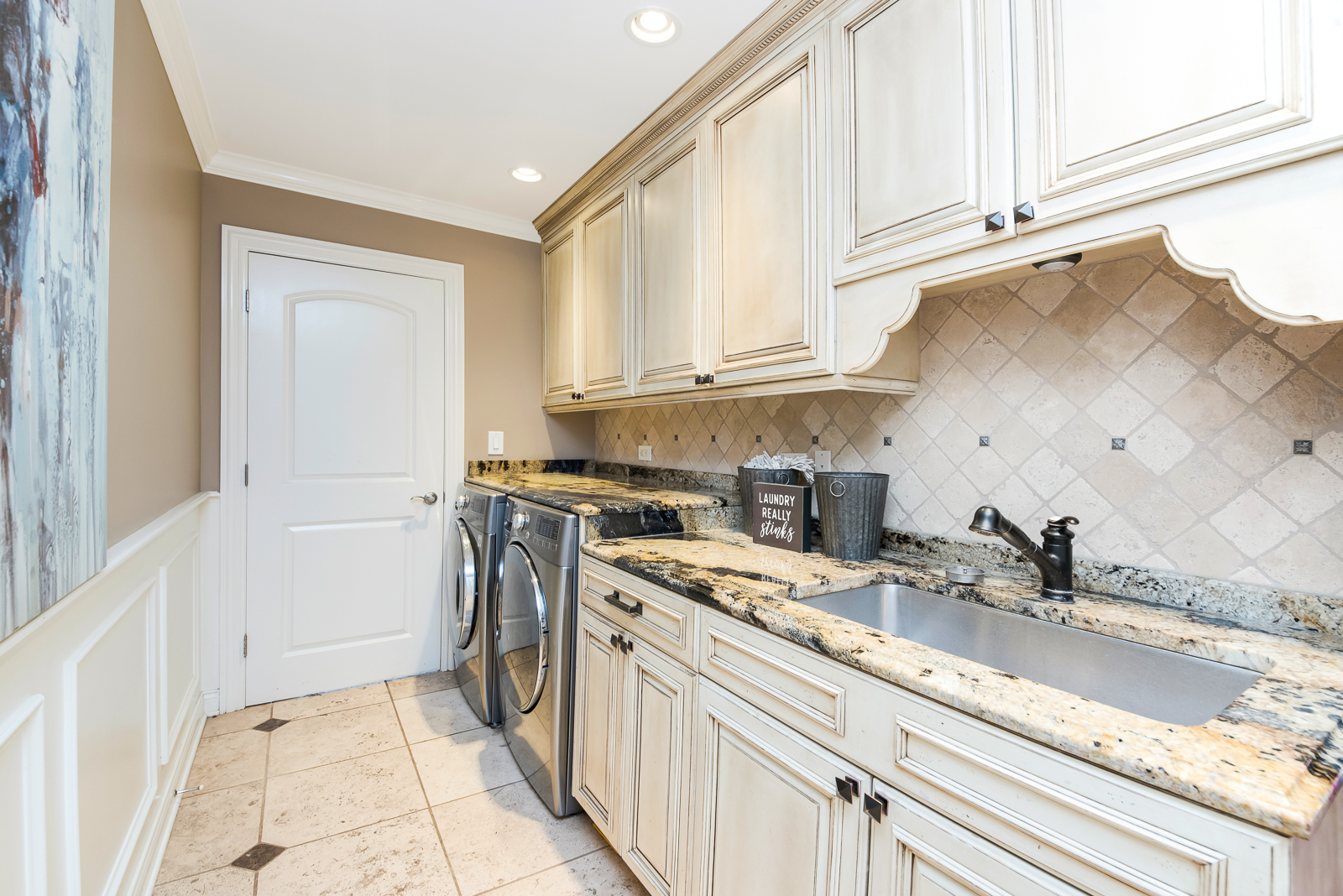 7 Sorrel Lemont, IL 60439 - Photo 17 of 36 a kitchen with stainless steel appliances granite countertop a sink stove and cabinets