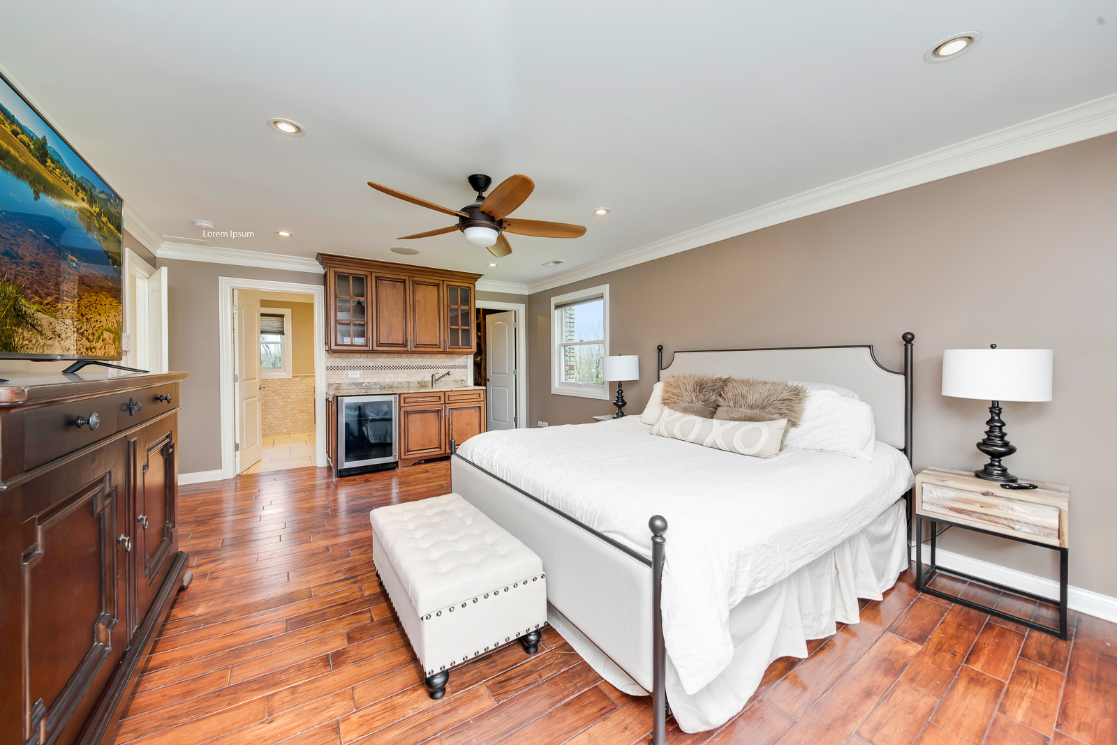 7 Sorrel Lemont, IL 60439 - Photo 24 of 36 a spacious bedroom with a bed and a flat screen tv