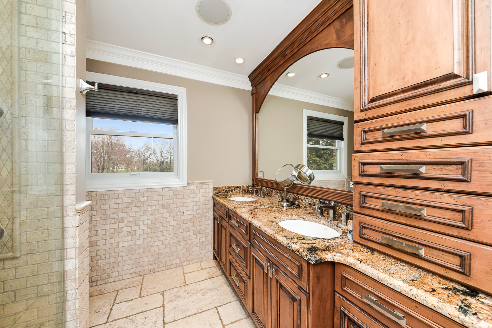 7 Sorrel Lemont, IL 60439 - Photo 25 of 36 a bathroom with a sink a vanity and a mirror