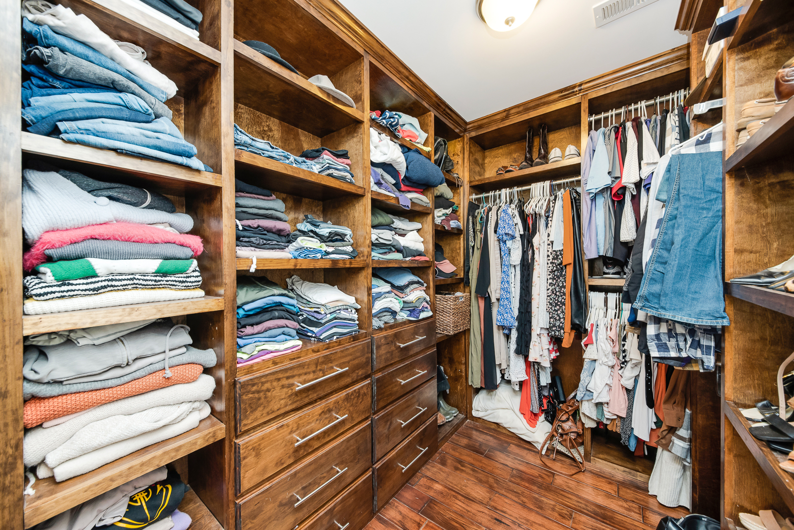 7 Sorrel Lemont, IL 60439 - Photo 28 of 36 a view of walk in closet with clothes and shoes