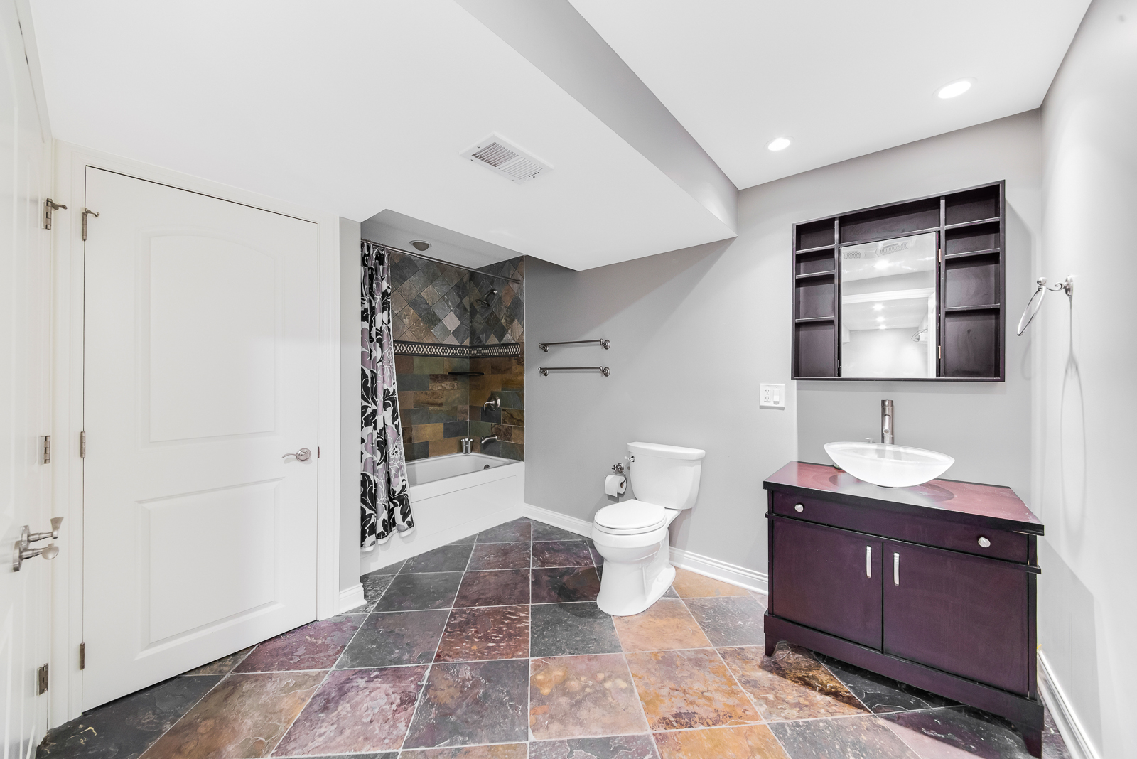 7 Sorrel Lemont, IL 60439 - Photo 33 of 36 a bathroom with a toilet a sink and mirror
