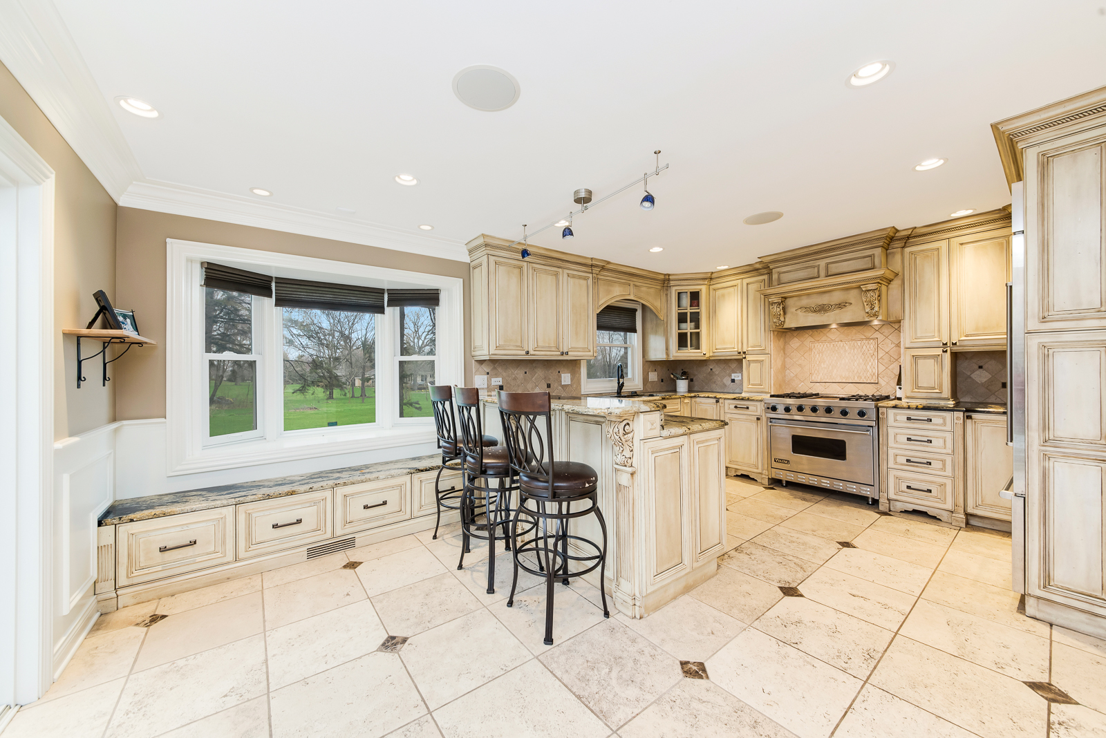 7 Sorrel Lemont, IL 60439 - Photo 5 of 36 a kitchen with cabinets and chairs