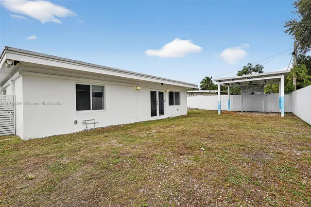 a house view with a backyard space