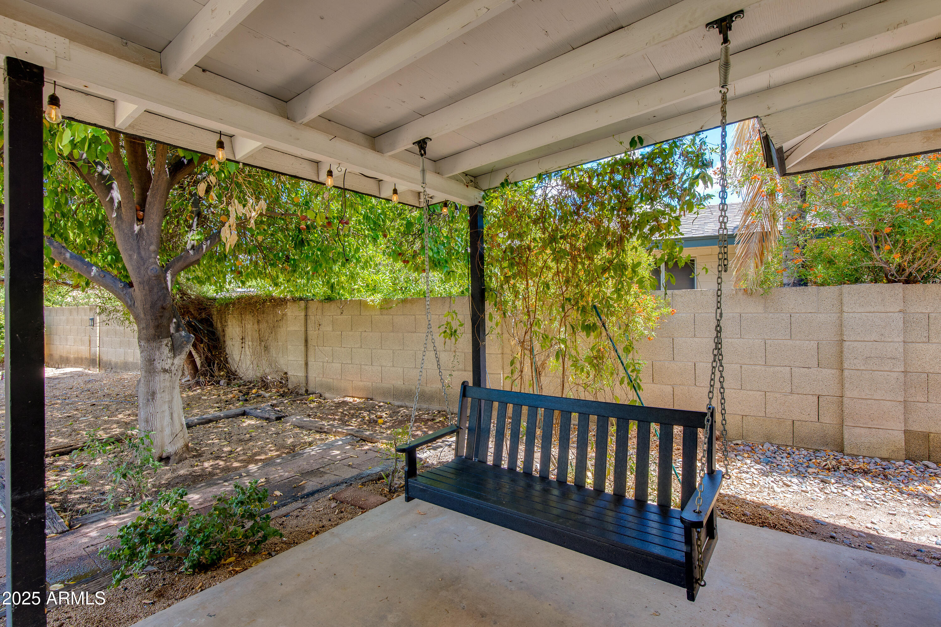 1820 West Seldon Way Phoenix, AZ 85021 - Photo 22 of 29 a view of a porch with a table chairs in a patio