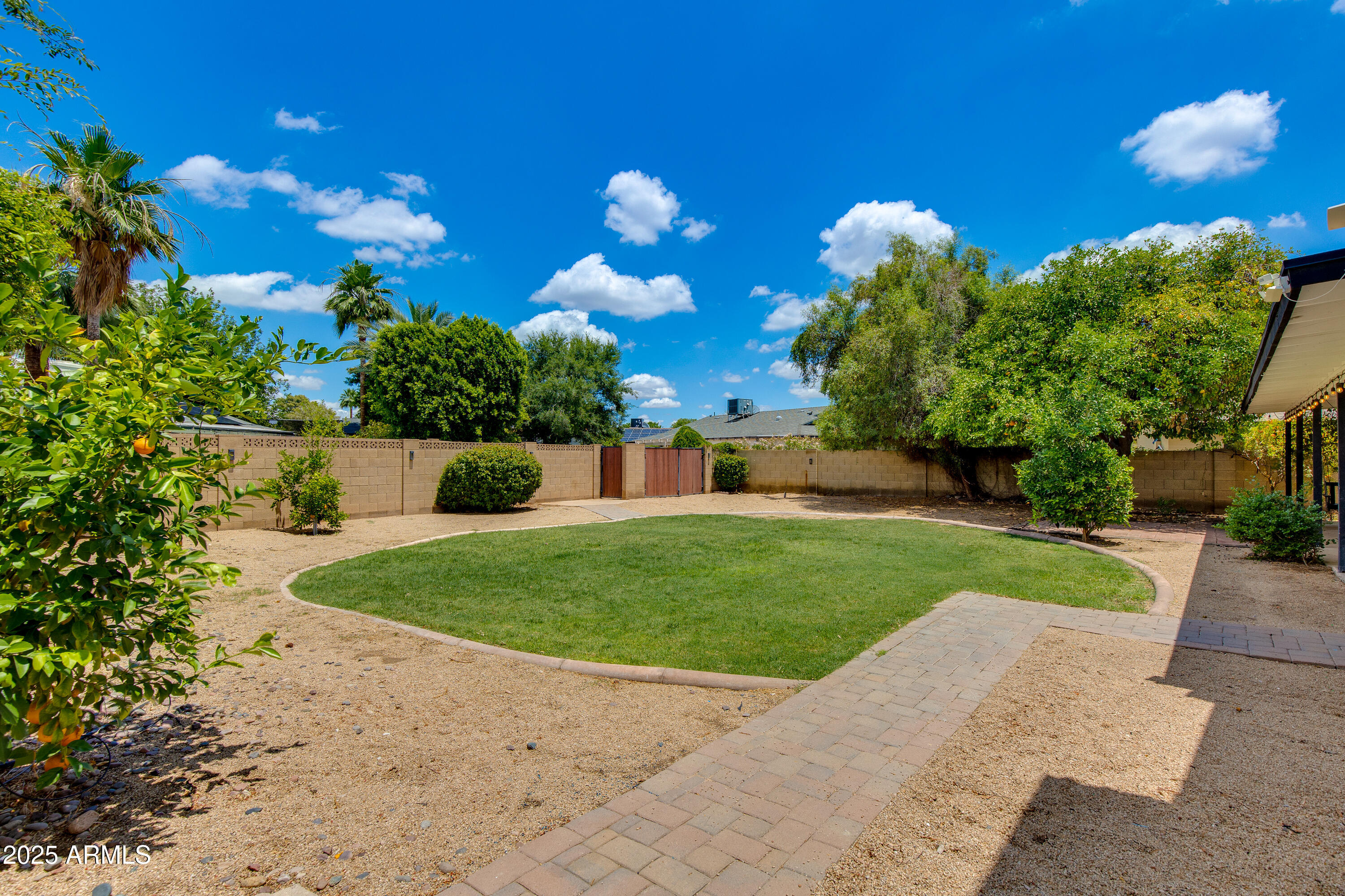 1820 West Seldon Way Phoenix, AZ 85021 - Photo 24 of 29 a view of a flower in front of house with a yard