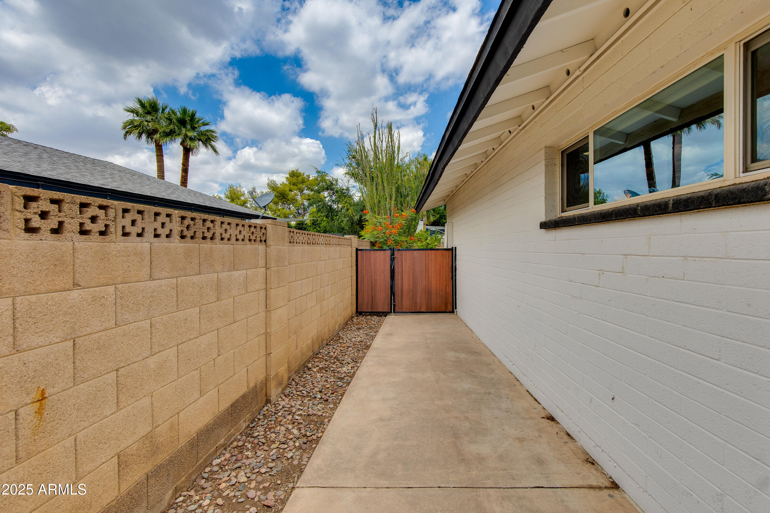 1820 West Seldon Way Phoenix, AZ 85021 - Photo 25 of 29 a view of a pathway both side of house