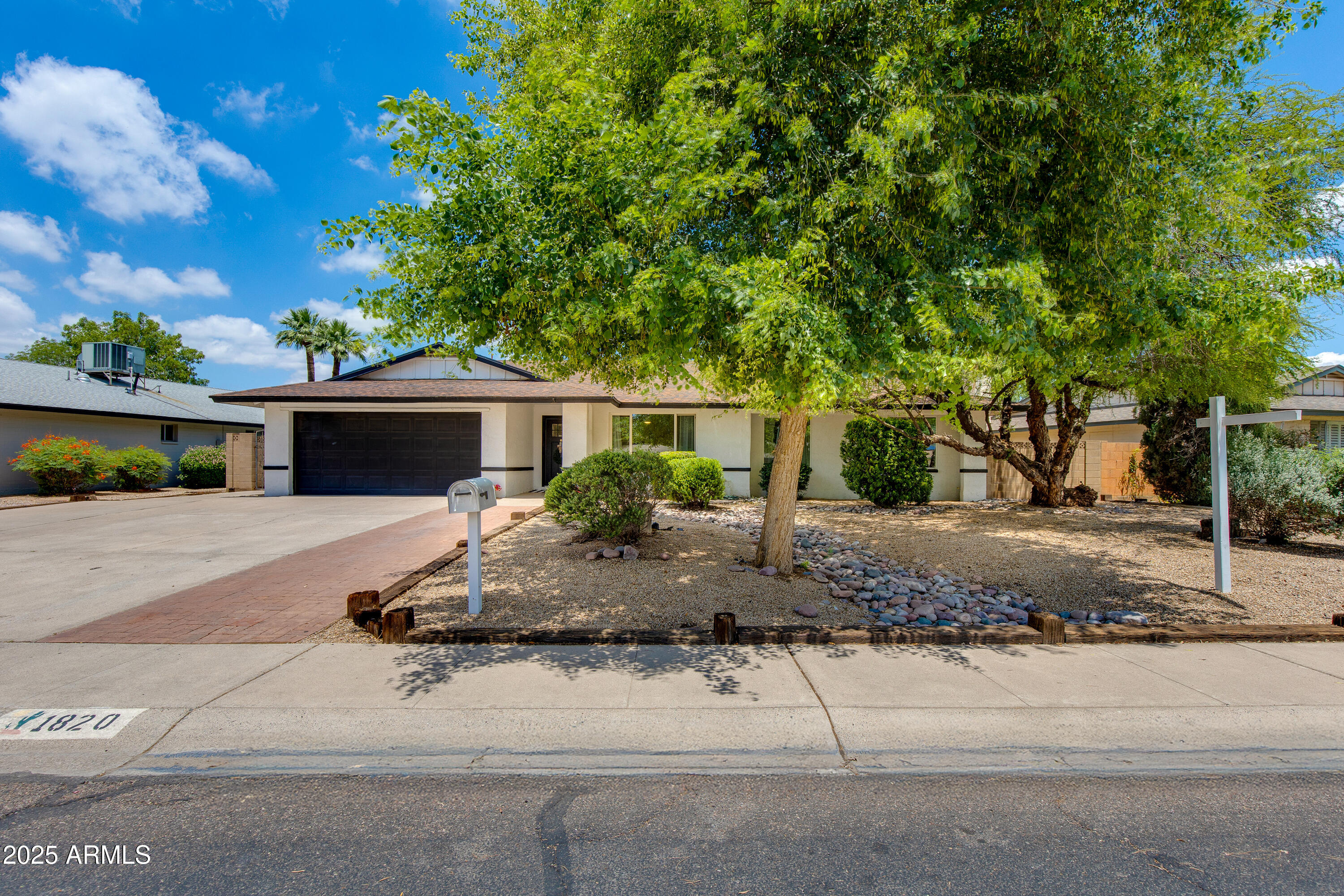 1820 West Seldon Way Phoenix, AZ 85021 - Photo 2 of 29 a front view of a house with garden