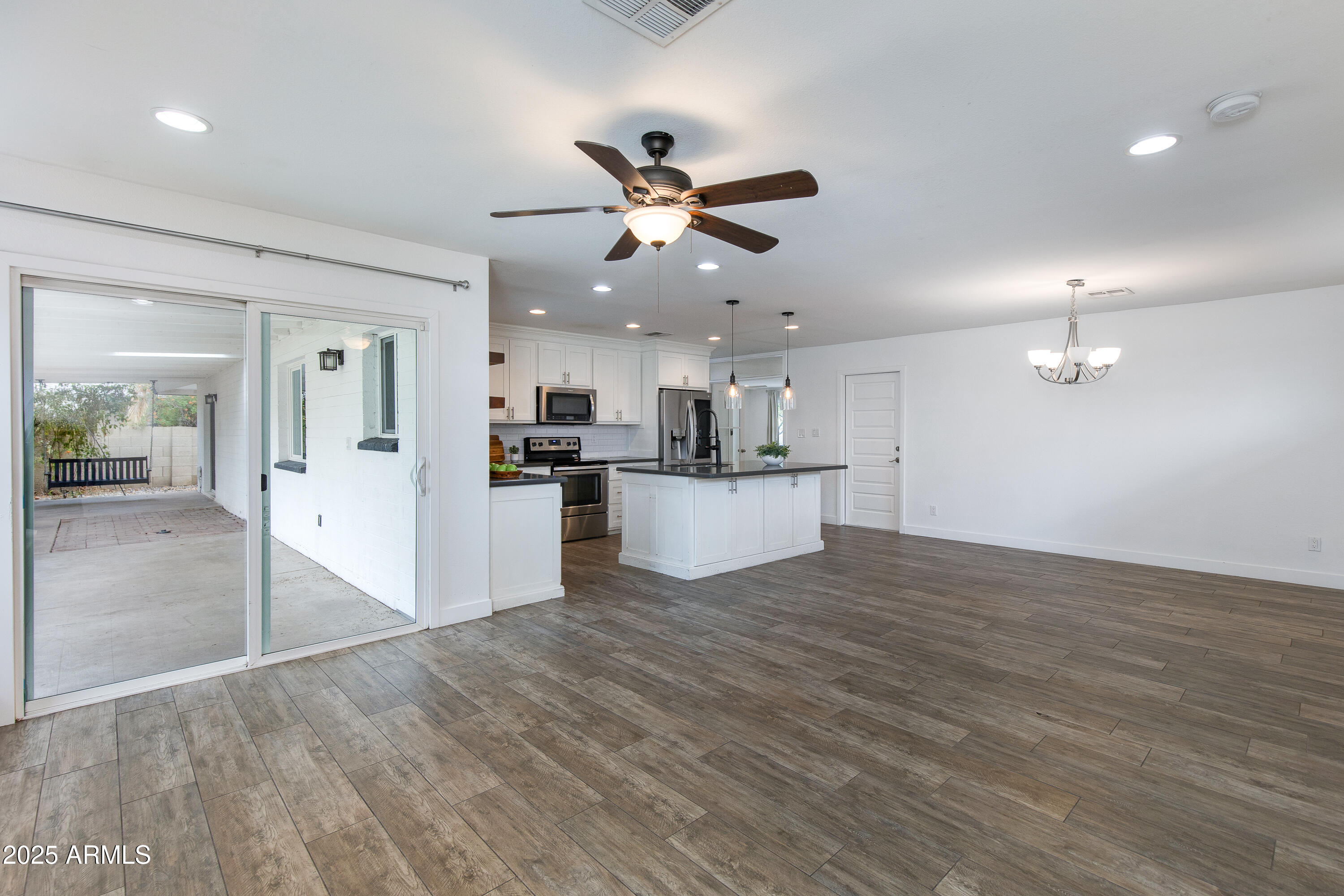 1820 West Seldon Way Phoenix, AZ 85021 - Photo 8 of 29 a view of a kitchen with a sink and a refrigerator