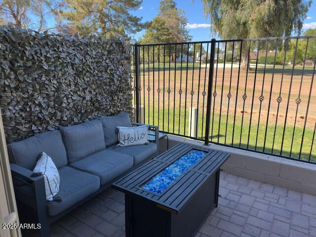18235 North 45th Avenue Glendale, AZ 85308 - Photo 22 of 39 a wooden bench sitting in front of a building
