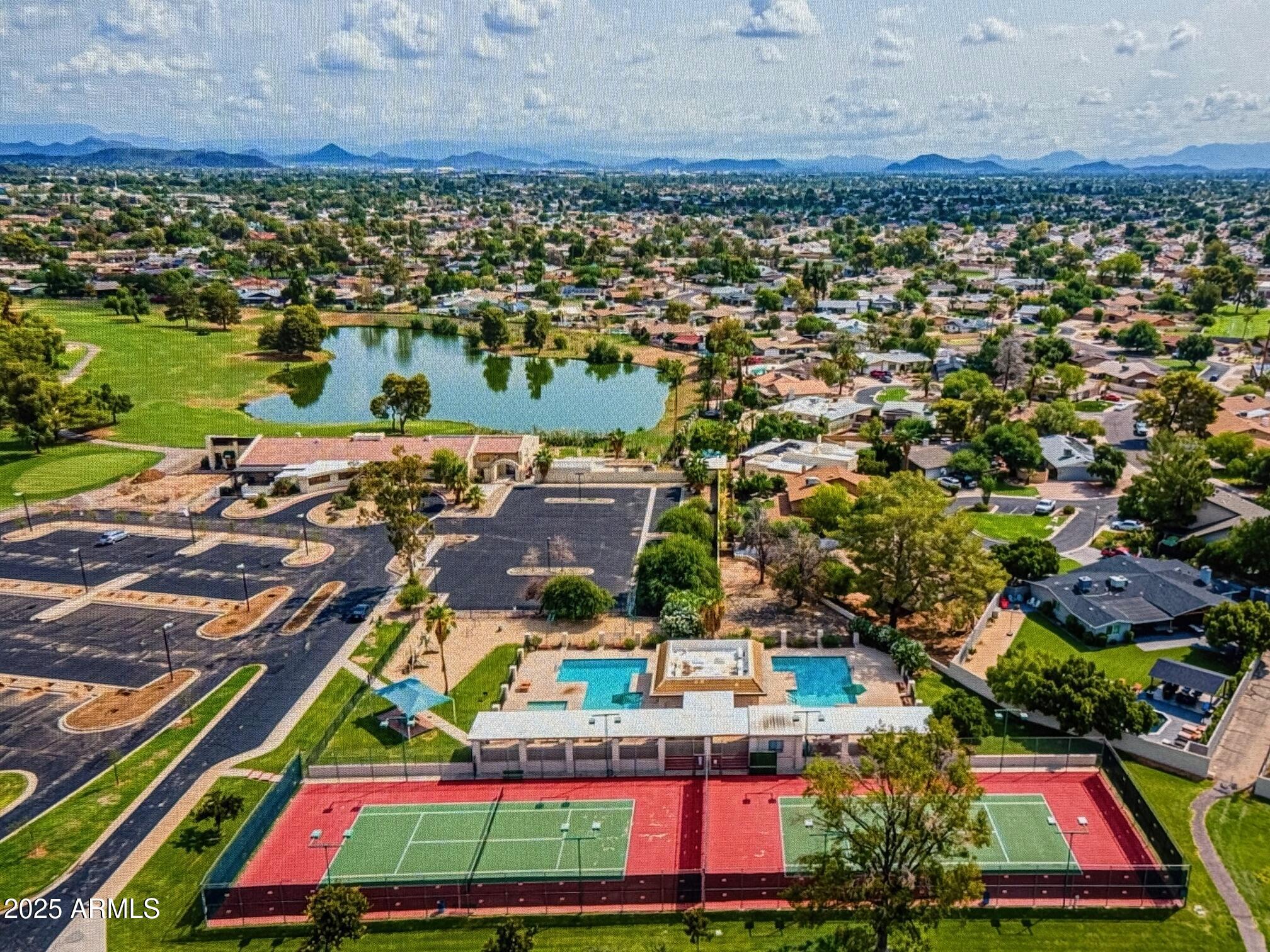 18235 North 45th Avenue Glendale, AZ 85308 - Photo 32 of 39 an aerial view of residential houses with outdoor space