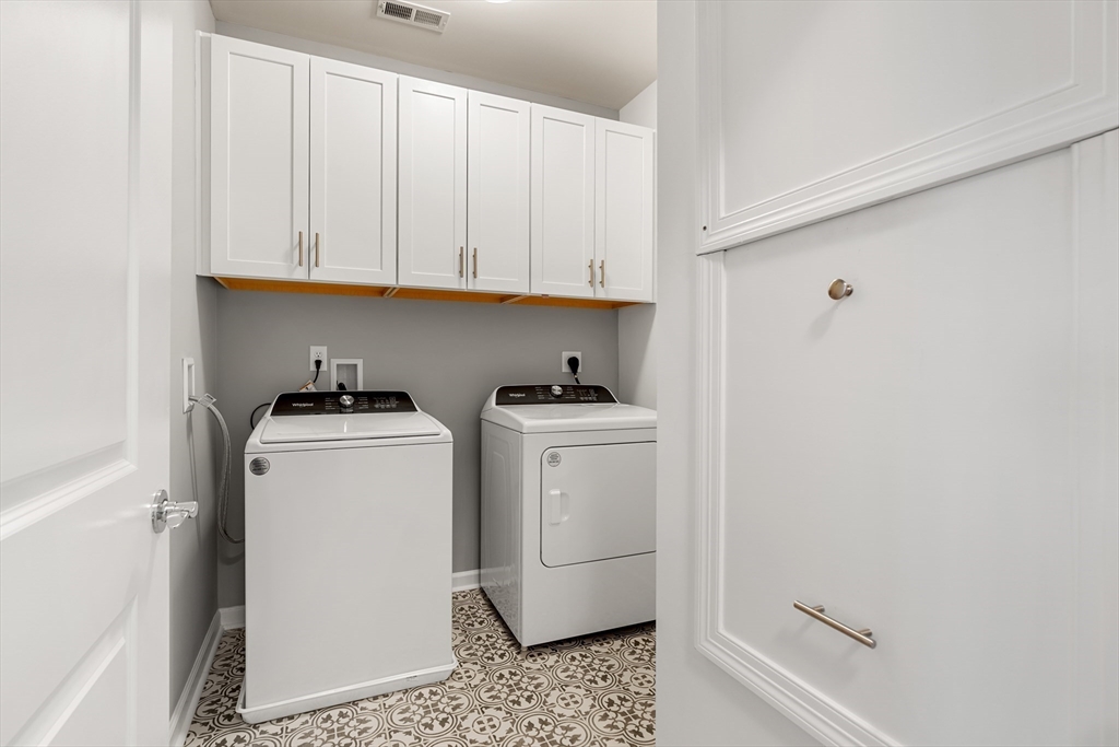 1 Codman Way, Unit 403 Westborough, MA 01581 - Photo 20 of 35 a utility room with dryer and washer