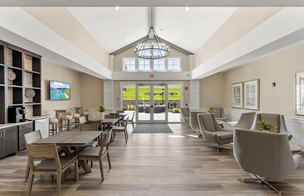 1 Codman Way, Unit 403 Westborough, MA 01581 - Photo 27 of 35 a view of a dining room with furniture window and outside view