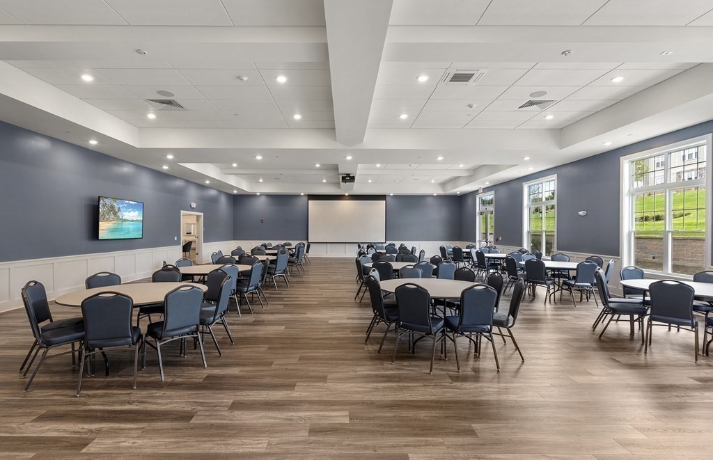 1 Codman Way, Unit 403 Westborough, MA 01581 - Photo 28 of 35 a view of a dining room with furniture window and wooden floor