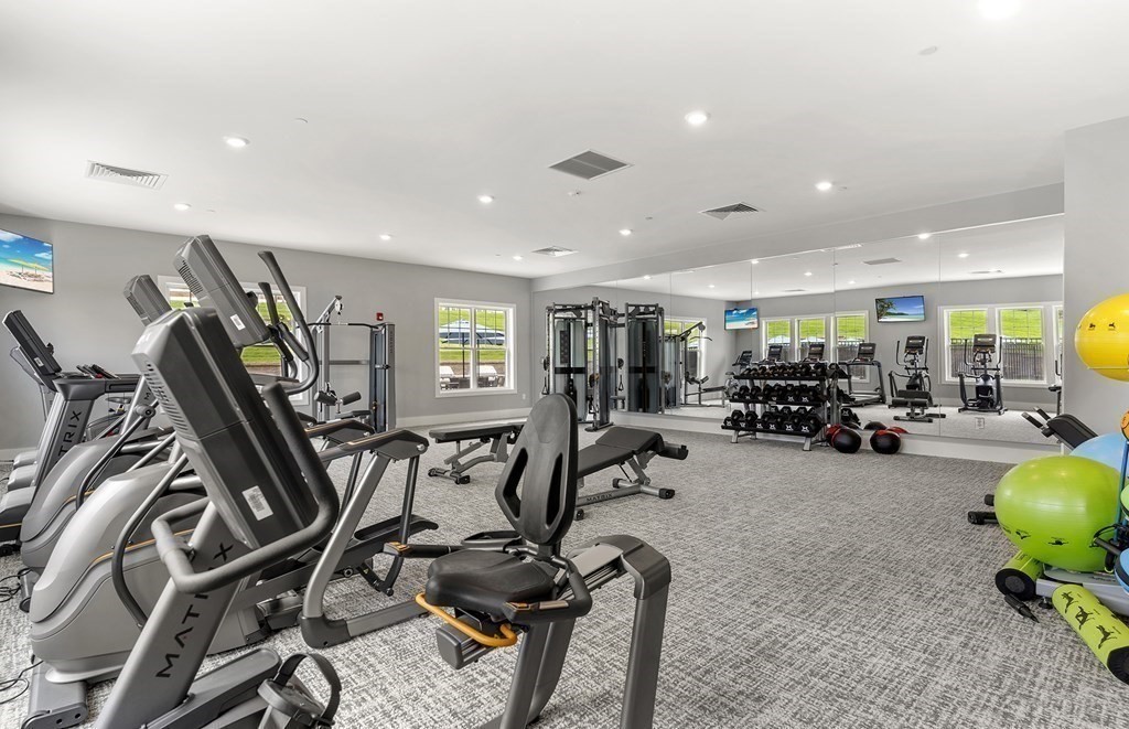 1 Codman Way, Unit 403 Westborough, MA 01581 - Photo 32 of 35 a view of a room with gym equipment