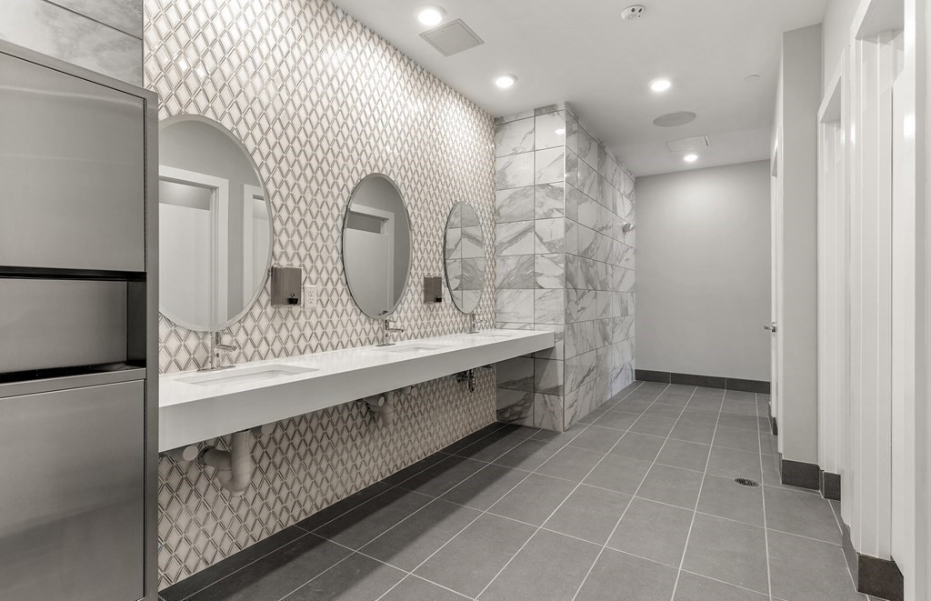 1 Codman Way, Unit 403 Westborough, MA 01581 - Photo 35 of 35 a bathroom with a double vanity sink and a mirror