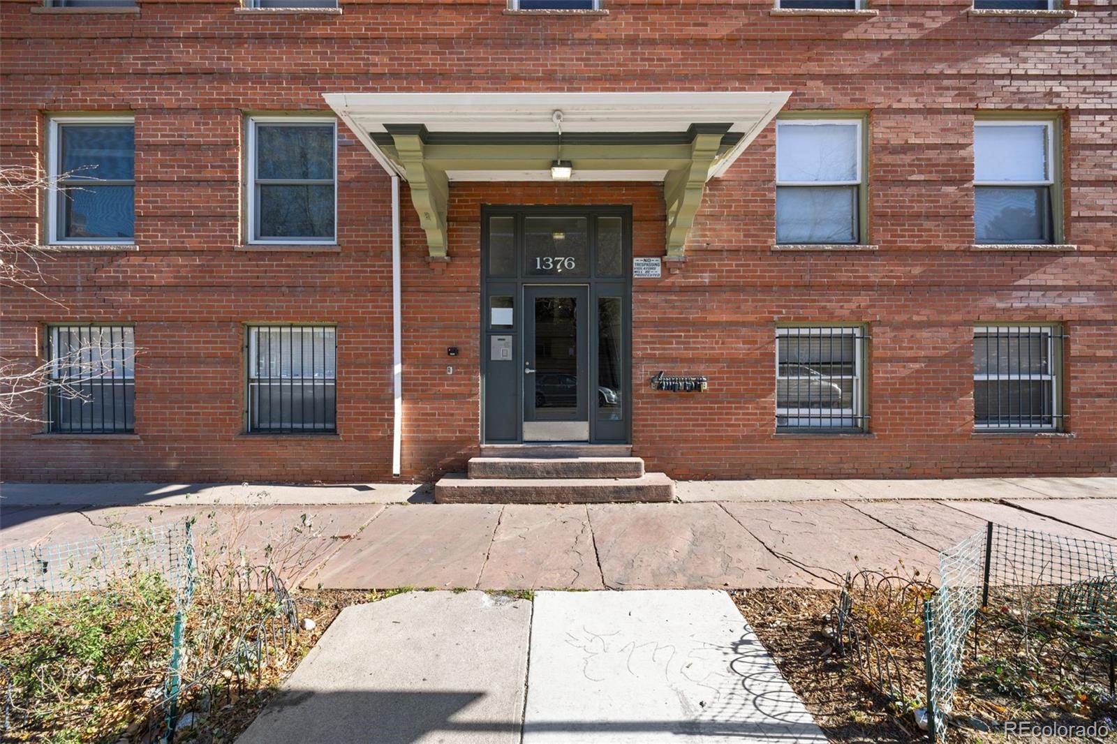 1376 Pearl Street, Unit 211 Denver, CO 80203 - Photo 4 of 26 a front view of a building