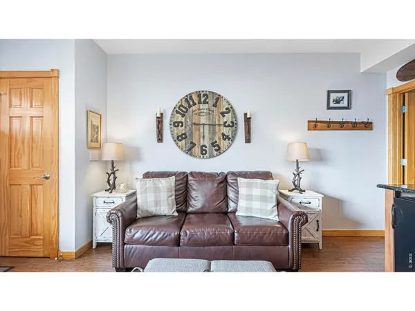 a kitchen with stainless steel appliances granite countertop a sink stove and microwave