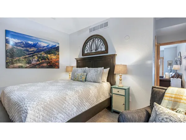 a bathroom with a sink double vanity and a mirror