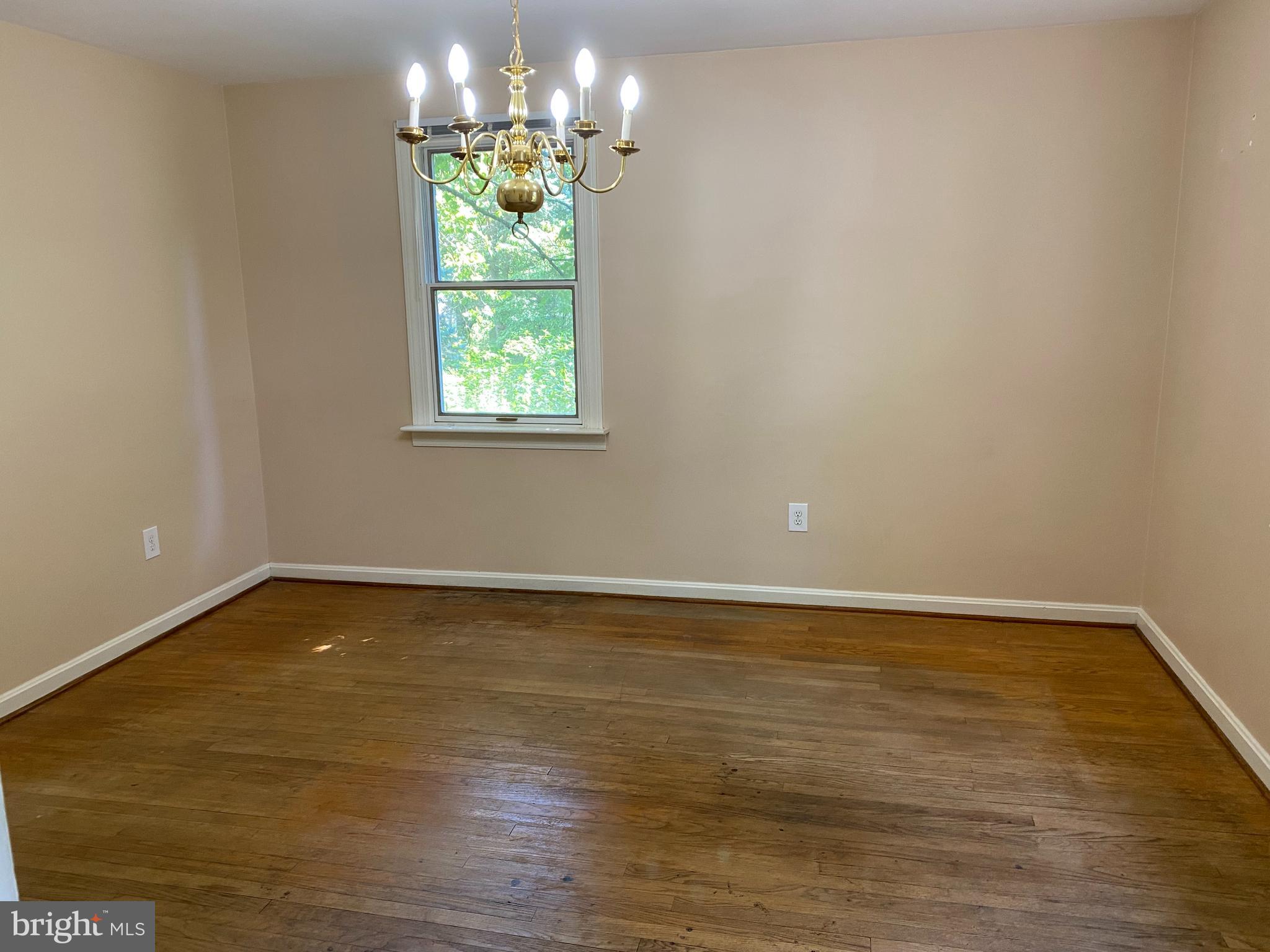 3315 Powder Mill Road Hyattsville, MD 20783 - Photo 14 of 49 FORMAL DINING ROOM, HARDWOOD FLOORING, CHANDELIER