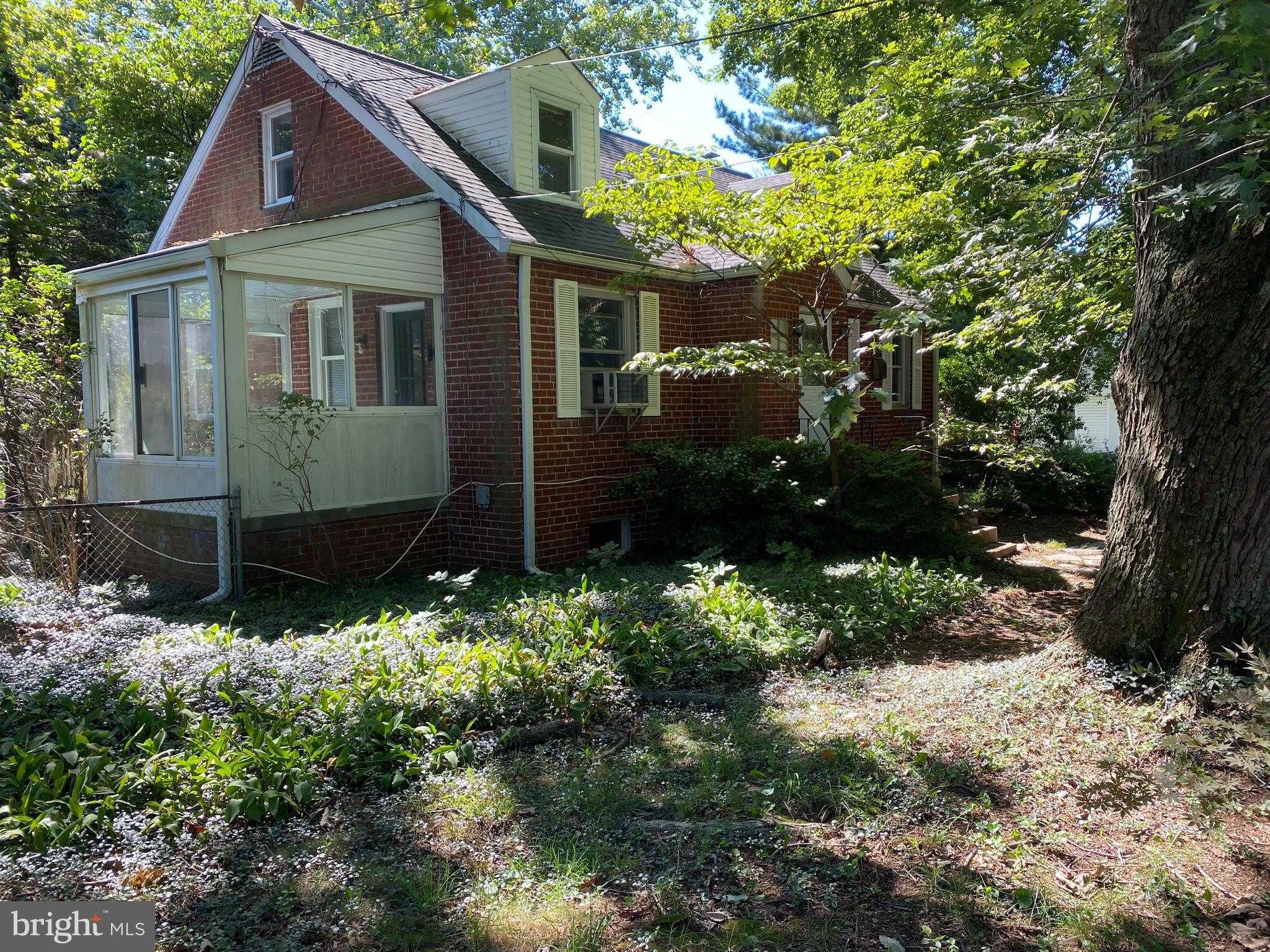 3315 Powder Mill Road Hyattsville, MD 20783 - Photo 3 of 49 NICE ENCLOSED PORCH OFF LIV RM WITH EXIT BACKYARD