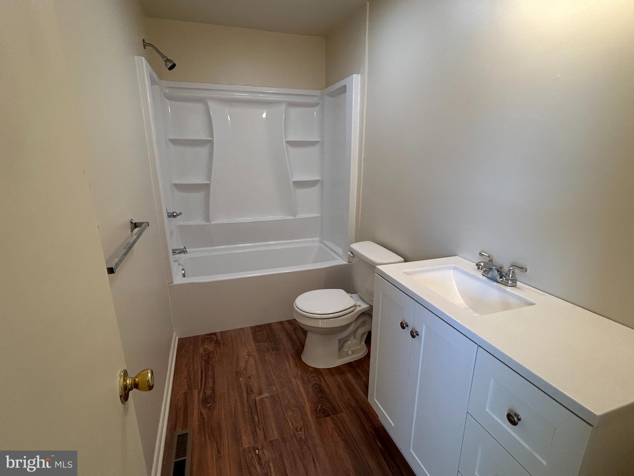 60 Stonegate Drive Eastampton, NJ 08060 - Photo 10 of 13 a bathroom with a sink toilet a mirror and shower