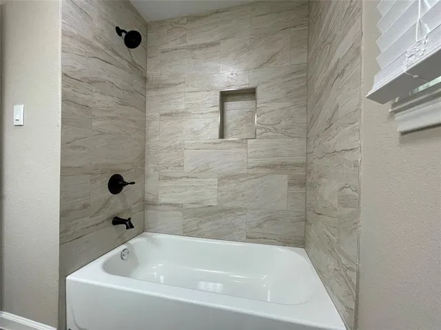 a bathroom with a tub