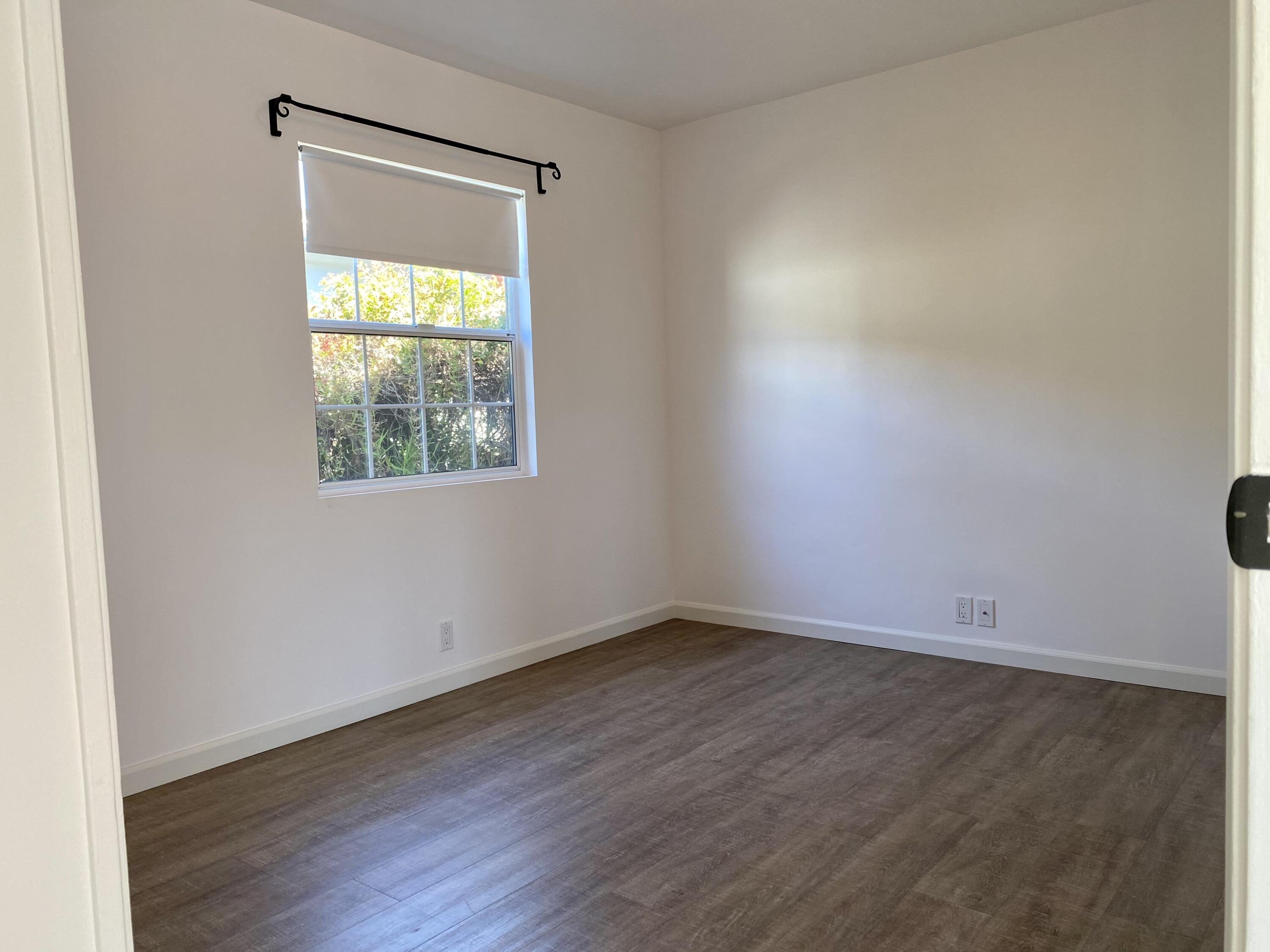4854 8th Street Carpinteria, CA 93013 - Photo 14 of 22 an empty room with a window