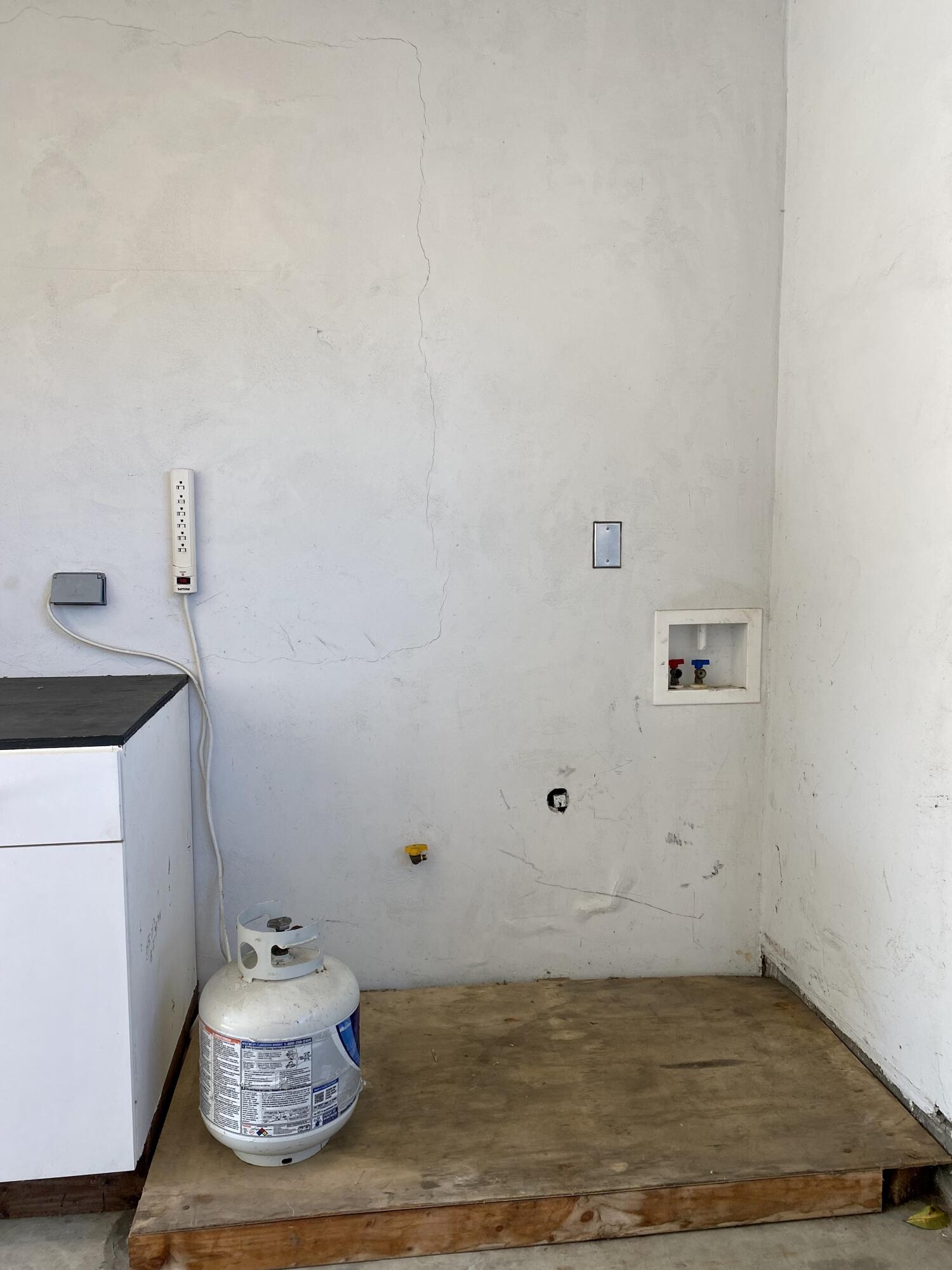 4854 8th Street Carpinteria, CA 93013 - Photo 20 of 22 a room with wooden floor and sink