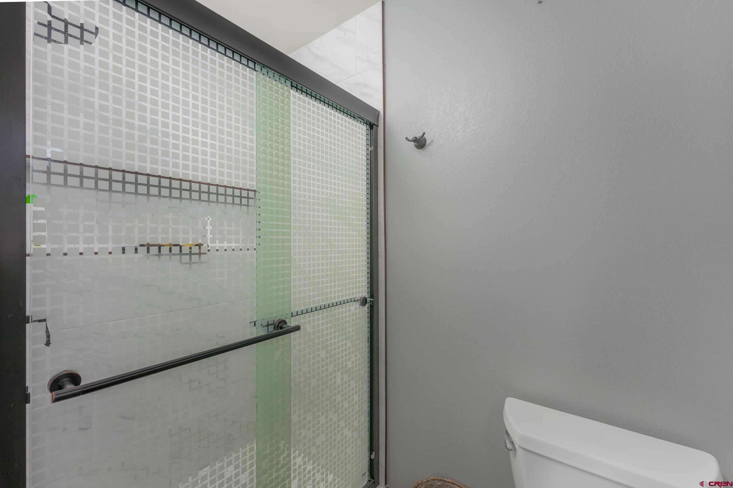 197 Buckhorn Road Bayfield, CO 81122 - Photo 20 of 34 a bathroom with a shower