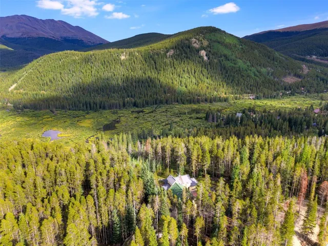 a view of swimming pool with a yard