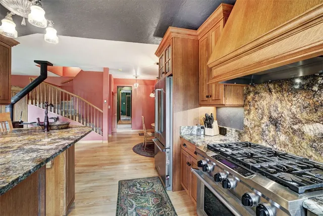 a view of living room kitchen and stove