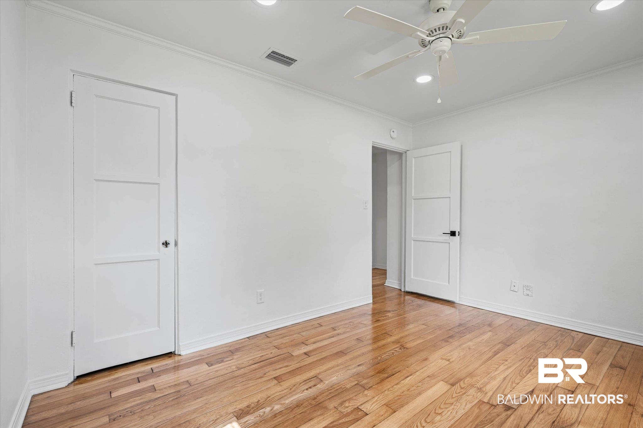 41 Hathaway Road West Mobile, AL 36608 - Photo 14 of 24 Unfurnished bedroom featuring ornamental molding, recessed lighting, light wood finished floors, and a ceiling fan