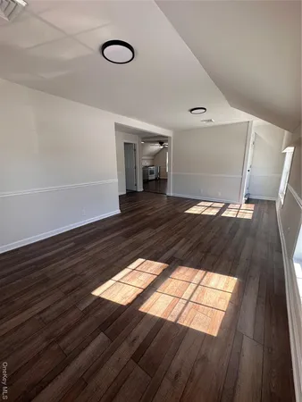 a view of wooden floor and staircase