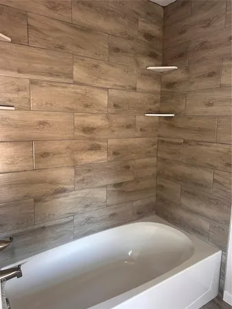 a bathroom with a bathtub