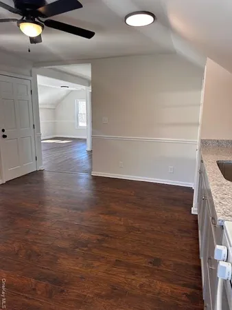 a view of a livingroom with wooden floor
