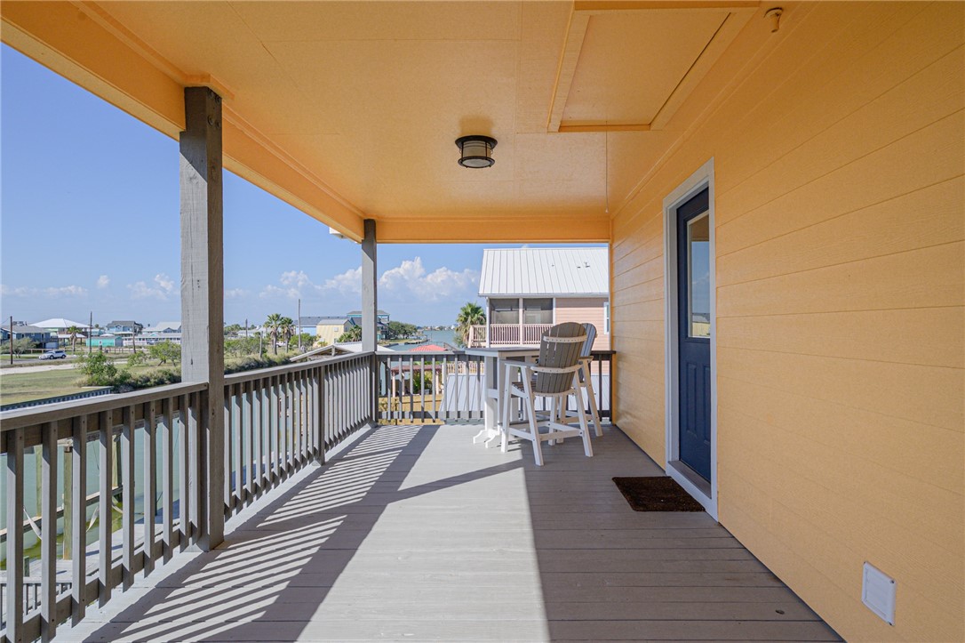 102 Ball Street Rockport, TX 78382 - Photo 19 of 40 a view of a balcony with chairs