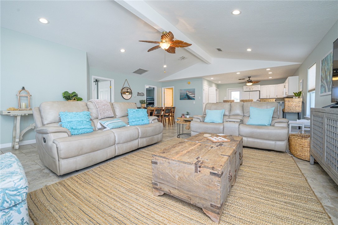 102 Ball Street Rockport, TX 78382 - Photo 22 of 40 a living room with furniture and kitchen view