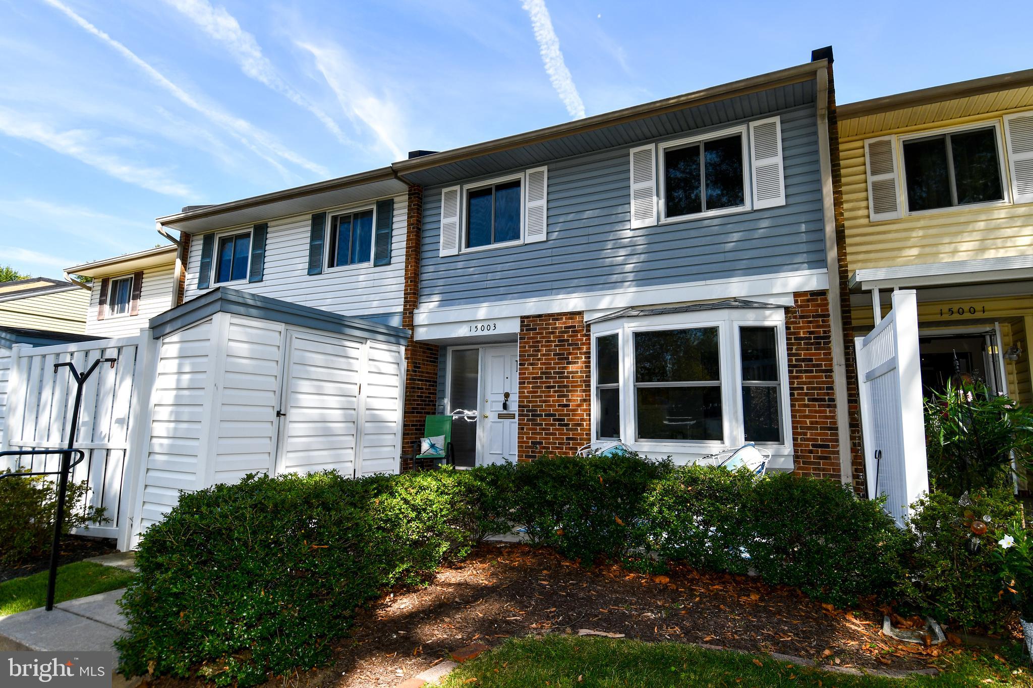 15003 Candover Court, Unit 281C Silver Spring, MD 20906 - Photo 42 of 42 a front view of a house with a yard